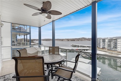 This well-positioned 5th-floor end-unit condo offers expansive on Tan-Tar-A Golf Club in Missouri - for sale on GolfHomes.com, golf home, golf lot