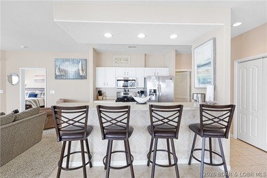 This well-positioned 5th-floor end-unit condo offers expansive on Tan-Tar-A Golf Club in Missouri - for sale on GolfHomes.com, golf home, golf lot