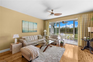 Enjoy breathtaking panoramic views of the serene lake and on Windstar on Naples Bay in Florida - for sale on GolfHomes.com, golf home, golf lot