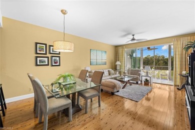 Enjoy breathtaking panoramic views of the serene lake and on Windstar on Naples Bay in Florida - for sale on GolfHomes.com, golf home, golf lot