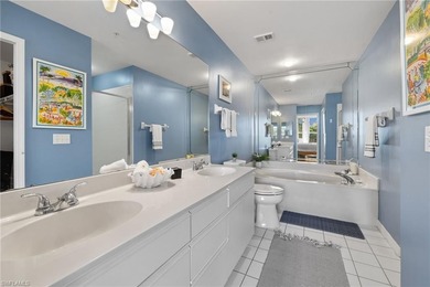 Enjoy breathtaking panoramic views of the serene lake and on Windstar on Naples Bay in Florida - for sale on GolfHomes.com, golf home, golf lot