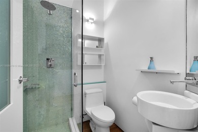 This detail oriented renovated unit is truly exceptional on Miami Beach Golf Club in Florida - for sale on GolfHomes.com, golf home, golf lot