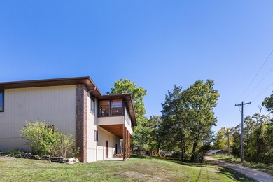 Getting to the lake has never been easier! This charming patio on Kimberling City Golf Club in Missouri - for sale on GolfHomes.com, golf home, golf lot