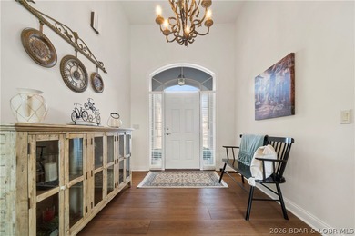 Step inside this stunning, updated villa perfectly positioned on on The Club At Porto Cima in Missouri - for sale on GolfHomes.com, golf home, golf lot