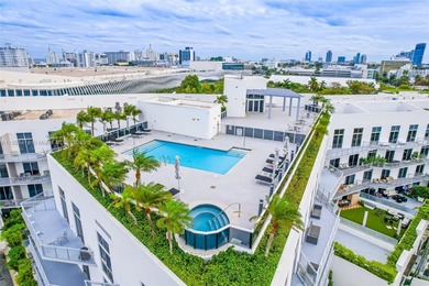 This detail oriented renovated unit is truly exceptional on Miami Beach Golf Club in Florida - for sale on GolfHomes.com, golf home, golf lot