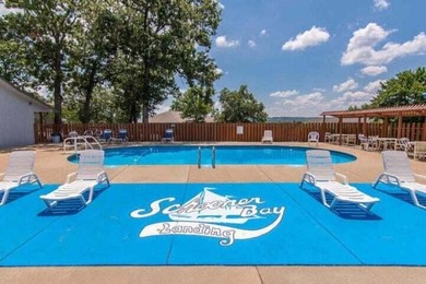 Getting to the lake has never been easier! This charming patio on Kimberling City Golf Club in Missouri - for sale on GolfHomes.com, golf home, golf lot