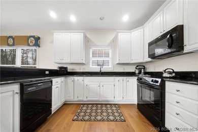 Step inside this stunning, updated villa perfectly positioned on on The Club At Porto Cima in Missouri - for sale on GolfHomes.com, golf home, golf lot