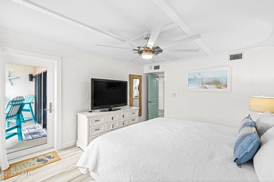 Perched on the top floor of Sugar Beach Condominiums, Unit C21 on Signal Hill Golf Course, Inc. in Florida - for sale on GolfHomes.com, golf home, golf lot