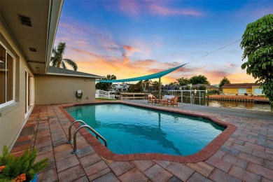 Embrace the Florida lifestyle in Dana Shores, where waterfront on Rocky Point Golf Course in Florida - for sale on GolfHomes.com, golf home, golf lot