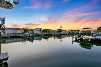 Embrace the Florida lifestyle in Dana Shores, where waterfront on Rocky Point Golf Course in Florida - for sale on GolfHomes.com, golf home, golf lot