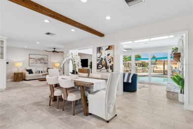 Embrace the Florida lifestyle in Dana Shores, where waterfront on Rocky Point Golf Course in Florida - for sale on GolfHomes.com, golf home, golf lot