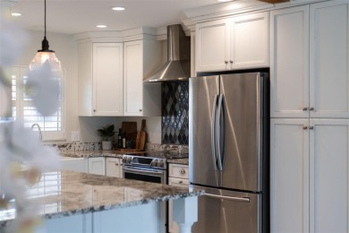 Embrace the Florida lifestyle in Dana Shores, where waterfront on Rocky Point Golf Course in Florida - for sale on GolfHomes.com, golf home, golf lot