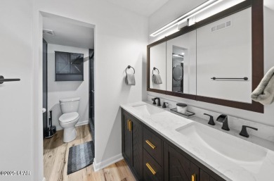 Step into this stunning condo, perfectly situated on the golf on Bay Point Resort Golf Club in Florida - for sale on GolfHomes.com, golf home, golf lot