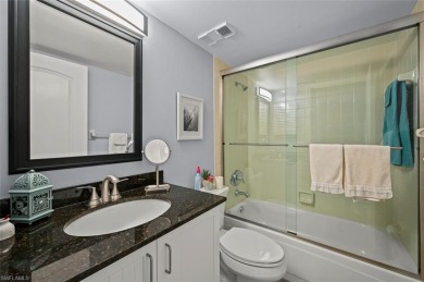 This beautifully updated lakefront home is located in Abbey On on Imperial Golf Club in Florida - for sale on GolfHomes.com, golf home, golf lot