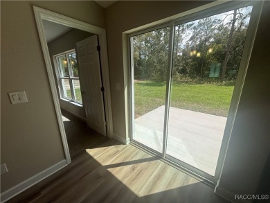 Charming New Construction in Citrus Springs - The Mini Pure on Citrus Springs Country Club in Florida - for sale on GolfHomes.com, golf home, golf lot