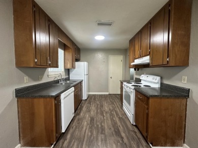 2Bed/1bath Quad overlooking Hilamin Golf Course several long on Hilaman Park Golf Course in Florida - for sale on GolfHomes.com, golf home, golf lot