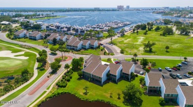 Step into this stunning condo, perfectly situated on the golf on Bay Point Resort Golf Club in Florida - for sale on GolfHomes.com, golf home, golf lot
