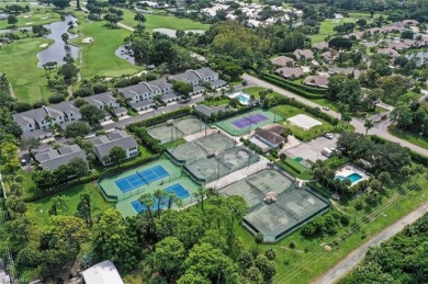 This beautifully updated lakefront home is located in Abbey On on Imperial Golf Club in Florida - for sale on GolfHomes.com, golf home, golf lot