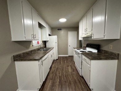 2Bed/1bath Quad overlooking Hilamin Golf Course several long on Hilaman Park Golf Course in Florida - for sale on GolfHomes.com, golf home, golf lot