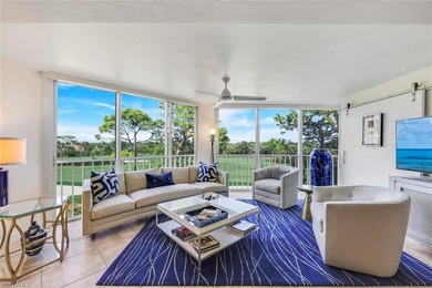 Sweeping golf course views and refined coastal elegance define on Bonita Bay West in Florida - for sale on GolfHomes.com, golf home, golf lot