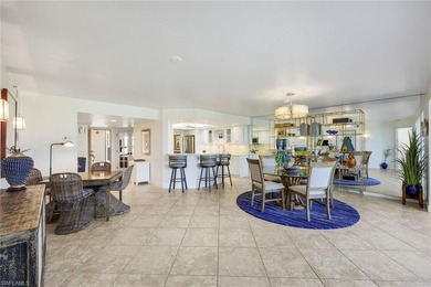 Sweeping golf course views and refined coastal elegance define on Bonita Bay West in Florida - for sale on GolfHomes.com, golf home, golf lot