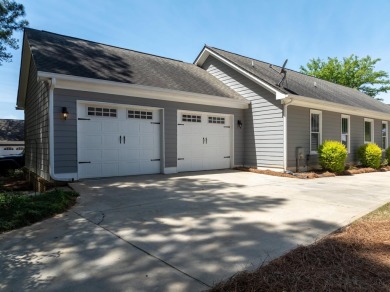 Located in the beautiful gated community of Harbor Club at Lake on Harbor Club Golf and Country Club in Georgia - for sale on GolfHomes.com, golf home, golf lot