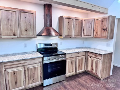 Brand-new construction, this home has never been lived in! The on Rumbling Bald Resort on Lake Lure in North Carolina - for sale on GolfHomes.com, golf home, golf lot