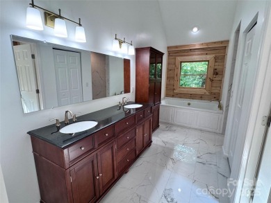 Brand-new construction, this home has never been lived in! The on Rumbling Bald Resort on Lake Lure in North Carolina - for sale on GolfHomes.com, golf home, golf lot