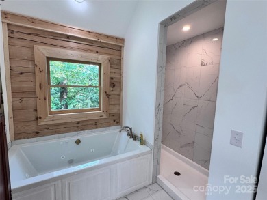 Brand-new construction, this home has never been lived in! The on Rumbling Bald Resort on Lake Lure in North Carolina - for sale on GolfHomes.com, golf home, golf lot