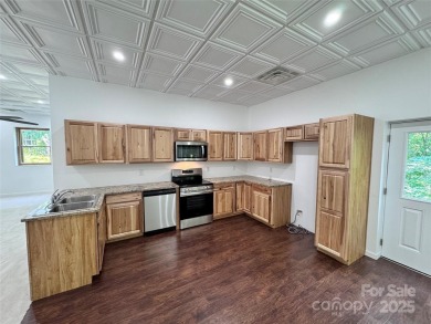 Brand-new construction, this home has never been lived in! The on Rumbling Bald Resort on Lake Lure in North Carolina - for sale on GolfHomes.com, golf home, golf lot