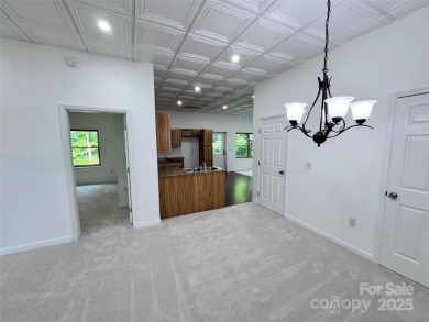Brand-new construction, this home has never been lived in! The on Rumbling Bald Resort on Lake Lure in North Carolina - for sale on GolfHomes.com, golf home, golf lot