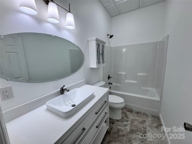 Brand-new construction, this home has never been lived in! The on Rumbling Bald Resort on Lake Lure in North Carolina - for sale on GolfHomes.com, golf home, golf lot