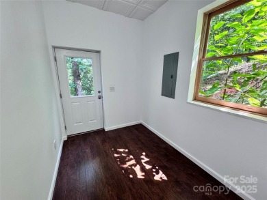 Brand-new construction, this home has never been lived in! The on Rumbling Bald Resort on Lake Lure in North Carolina - for sale on GolfHomes.com, golf home, golf lot