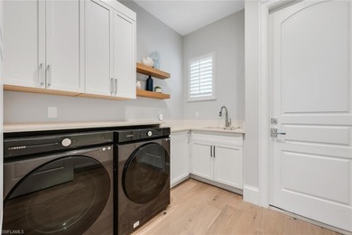 A masterfully renovated Watercrest in Pelican Marsh residence on Pelican Marsh Golf Club in Florida - for sale on GolfHomes.com, golf home, golf lot