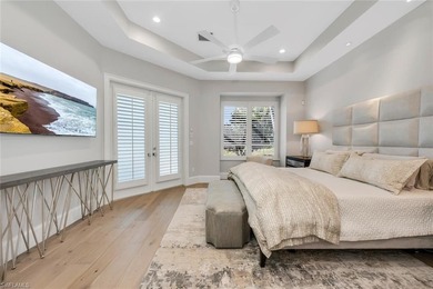 A masterfully renovated Watercrest in Pelican Marsh residence on Pelican Marsh Golf Club in Florida - for sale on GolfHomes.com, golf home, golf lot