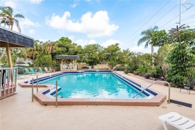 BEAUTIFULL REMODELED 2 BEDROOM 2 BATH CONDO - Enter through the on Seminole Lake Country Club in Florida - for sale on GolfHomes.com, golf home, golf lot