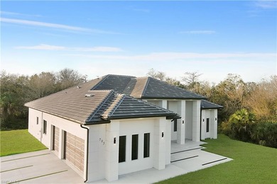 Welcome to 705 16th Street NE, a stunning contemporary on The Club At Twin Eagles in Florida - for sale on GolfHomes.com, golf home, golf lot