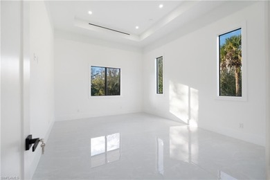 Welcome to 705 16th Street NE, a stunning contemporary on The Club At Twin Eagles in Florida - for sale on GolfHomes.com, golf home, golf lot