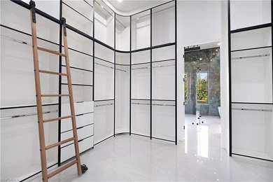 Welcome to 705 16th Street NE, a stunning contemporary on The Club At Twin Eagles in Florida - for sale on GolfHomes.com, golf home, golf lot