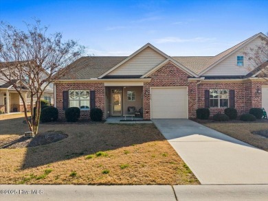 Experience the pleasures of coastal living in this charming on South Harbour Golf Links in North Carolina - for sale on GolfHomes.com, golf home, golf lot