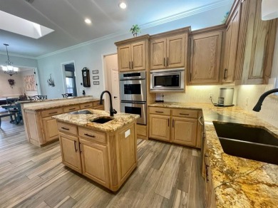 Discover this exquisitely spacious home nestled on a cul-desac on Pecan Plantation Country Club in Texas - for sale on GolfHomes.com, golf home, golf lot