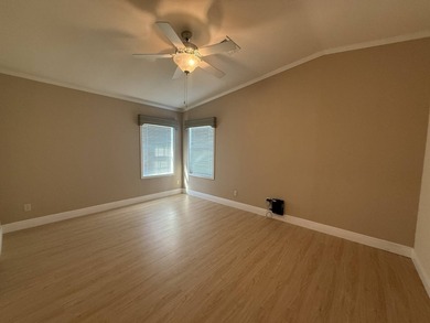 Spacious mobile home in a desirable and active community.  Step on Water Oak Country Club Estates in Florida - for sale on GolfHomes.com, golf home, golf lot