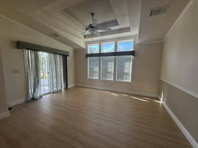 Spacious mobile home in a desirable and active community.  Step on Water Oak Country Club Estates in Florida - for sale on GolfHomes.com, golf home, golf lot