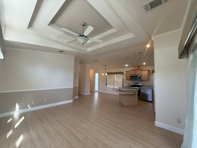 Spacious mobile home in a desirable and active community.  Step on Water Oak Country Club Estates in Florida - for sale on GolfHomes.com, golf home, golf lot