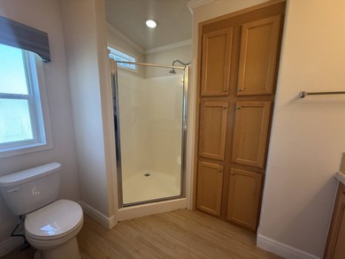 Spacious mobile home in a desirable and active community.  Step on Water Oak Country Club Estates in Florida - for sale on GolfHomes.com, golf home, golf lot