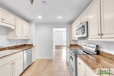 This first-floor residence offers convenient dual entrances - on Wilmington Island Club in Georgia - for sale on GolfHomes.com, golf home, golf lot