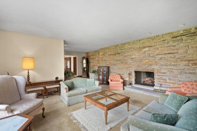 This sprawling Cedar sided w/accents of Lannon stone Ranch is on Whitnall Park Golf Club in Wisconsin - for sale on GolfHomes.com, golf home, golf lot