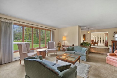 This sprawling Cedar sided w/accents of Lannon stone Ranch is on Whitnall Park Golf Club in Wisconsin - for sale on GolfHomes.com, golf home, golf lot