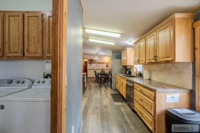 Location, location, location! Just 20 minutes from Yellowstone on Island Park Village Resort Golf Course in Idaho - for sale on GolfHomes.com, golf home, golf lot