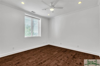 This first-floor residence offers convenient dual entrances - on Wilmington Island Club in Georgia - for sale on GolfHomes.com, golf home, golf lot